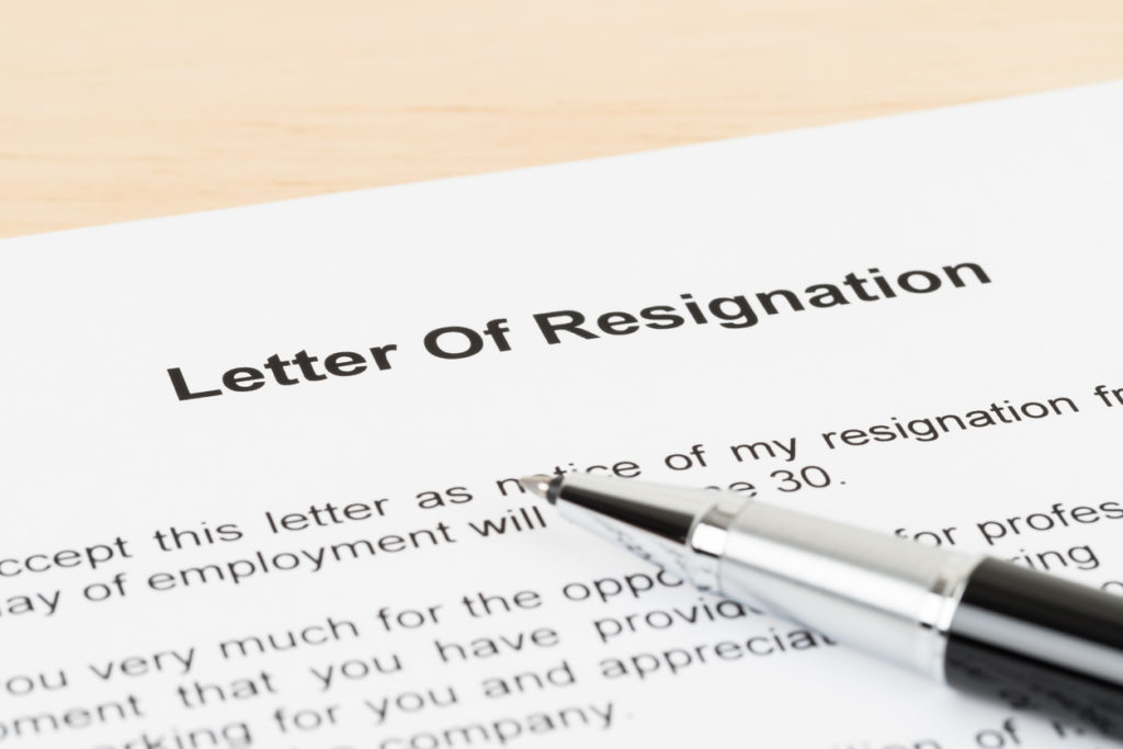 Resignation letter resign with pen